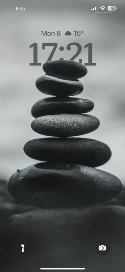 A pile of decorative stones stacked on top of each other - depth effect wallpaper