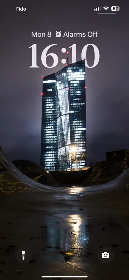A high-rise building captured under a gray sky. - depth effect wallpaper