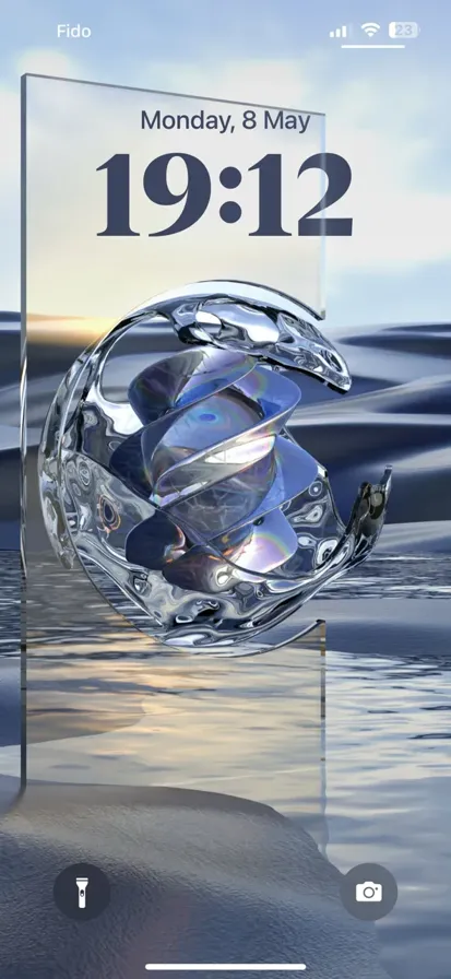 A crystal object floating on top of a body of water