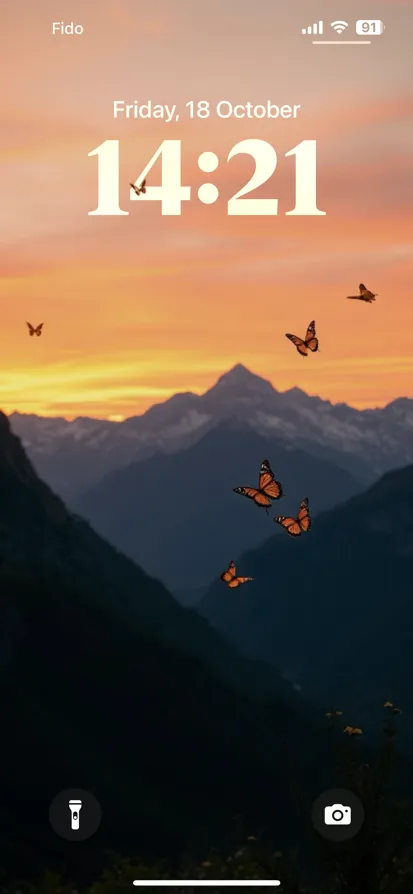 A serene sunset landscape with graceful butterflies and majestic mountains.