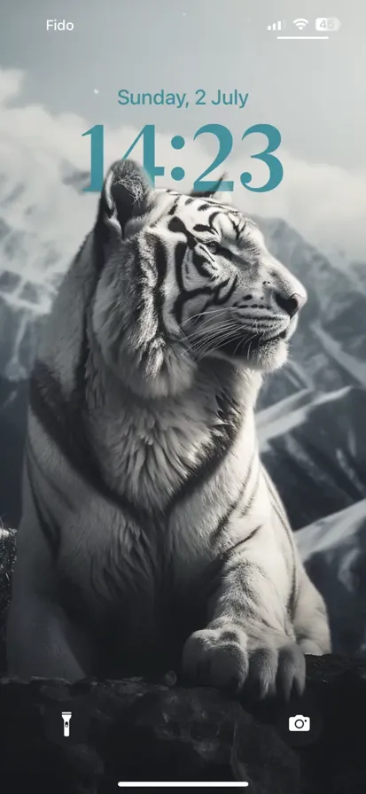 A majestic white tiger prowling on a rocky mountain cliff