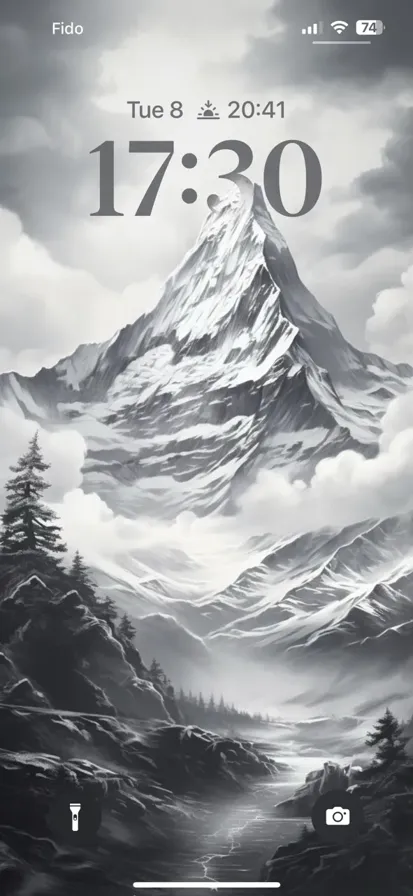 Black and white mountain landscape with a peaceful and realistic atmosphere.