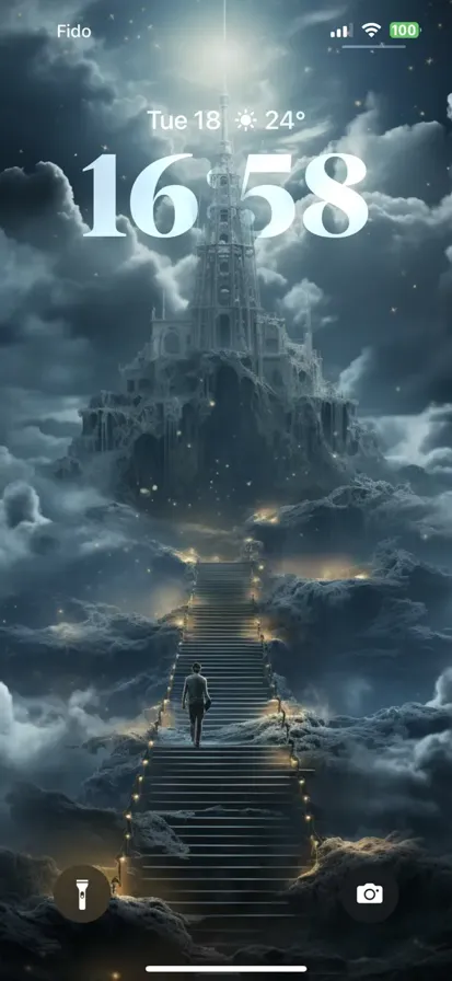 A man is walking towards a stairway that leads to a huge castle.