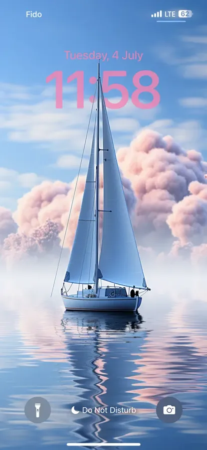 Serene sailboat glides gracefully on calm waters under clear blue sky, evoking tranquility, freedom, and beauty of open sea.