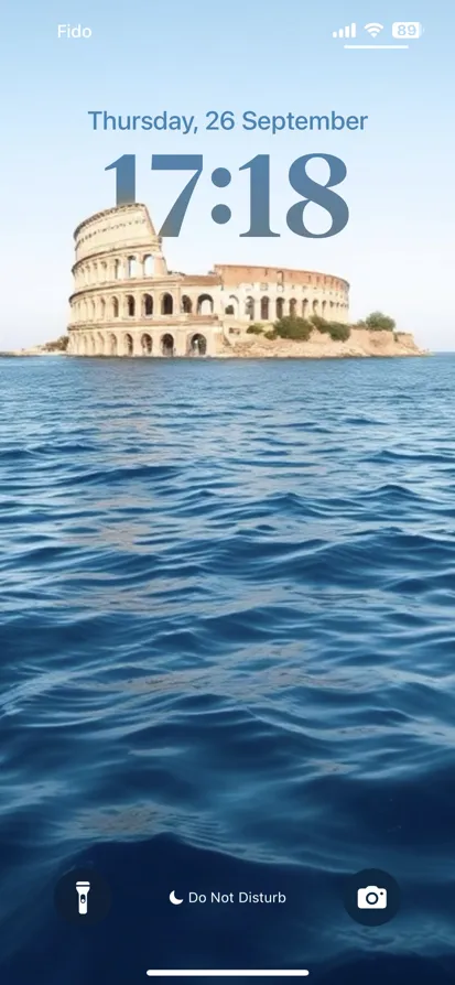 A tranquil scene of water and a historic structure.