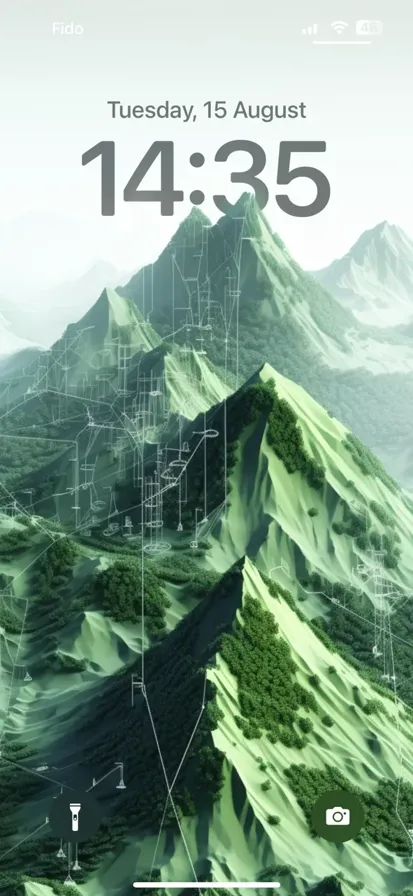 A picture of a forested mountain fading into a triangular irregular network - depth effect wallpaper