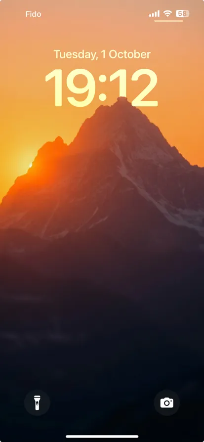 A silhouetted mountain against a colorful sunset. - depth effect wallpaper