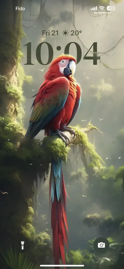 A macaw with red and blue feathers is perched on a tree branch in the Amazon rainforest.